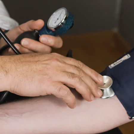 doctor-checking-blood-pressure